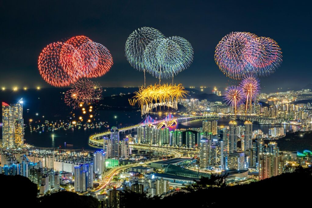 busan-fireworks-festival-gwangalli-beach "Spectacular fireworks over Gwangalli Beach and Gwangandaegyo Bridge during the Busan Fireworks Festival in South Korea."