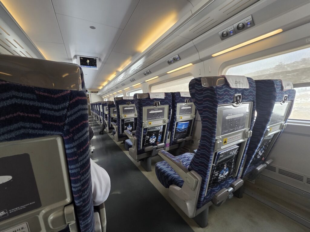 camp-humphreys-to-pyeongtaek-station-train-connection. Inside a Korean train, showing how travelers can continue their trip after going from Camp Humphreys to Pyeongtaek Station