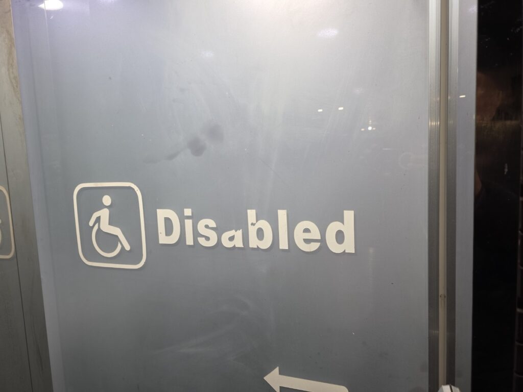 disabled-accessible-restroom-seoul Universal design and disabled-accessible restroom signage at Seoul Han River park.