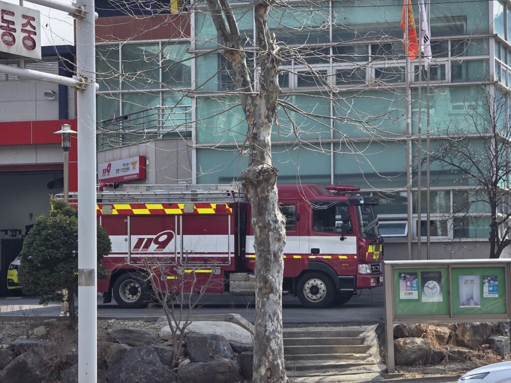 how-to-call-119-in-korea-fire-truck-at-station Korean fire truck parked outside a 119 safety center showing emergency response in Korea