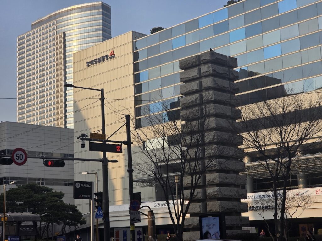 korea-city-air-terminal-calt-building-exterior-gangnam The modern glass facade of the Korea City Air Terminal CALT building located in Samseong-dong, Gangnam.