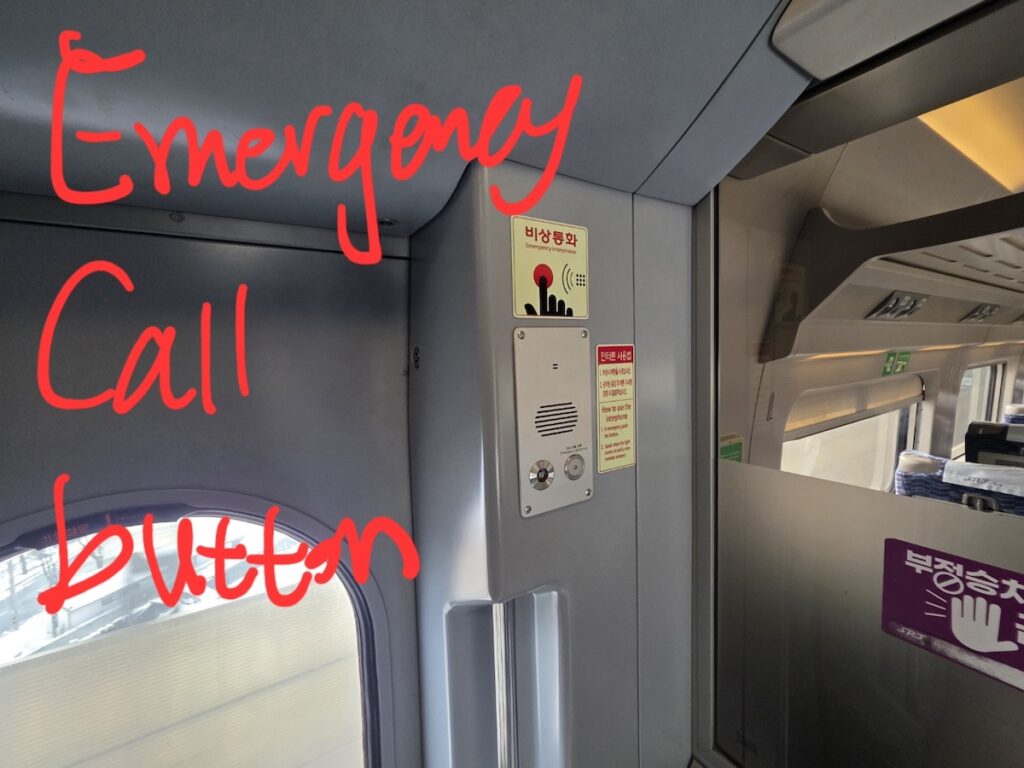 korea-travel-ktx-standing-ticket-ritual-emergency Korea Travel: KTX Standing Ticket Ritual - Safety protocols near the standing warrior's post.