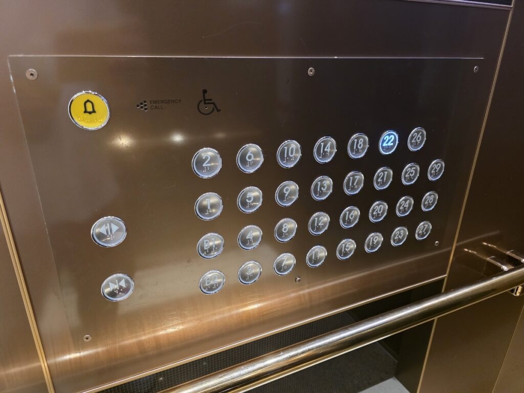 korean-elevator-cancel-button “Close-up of Korean elevator button panel with cancel function highlighted for mistake correction”