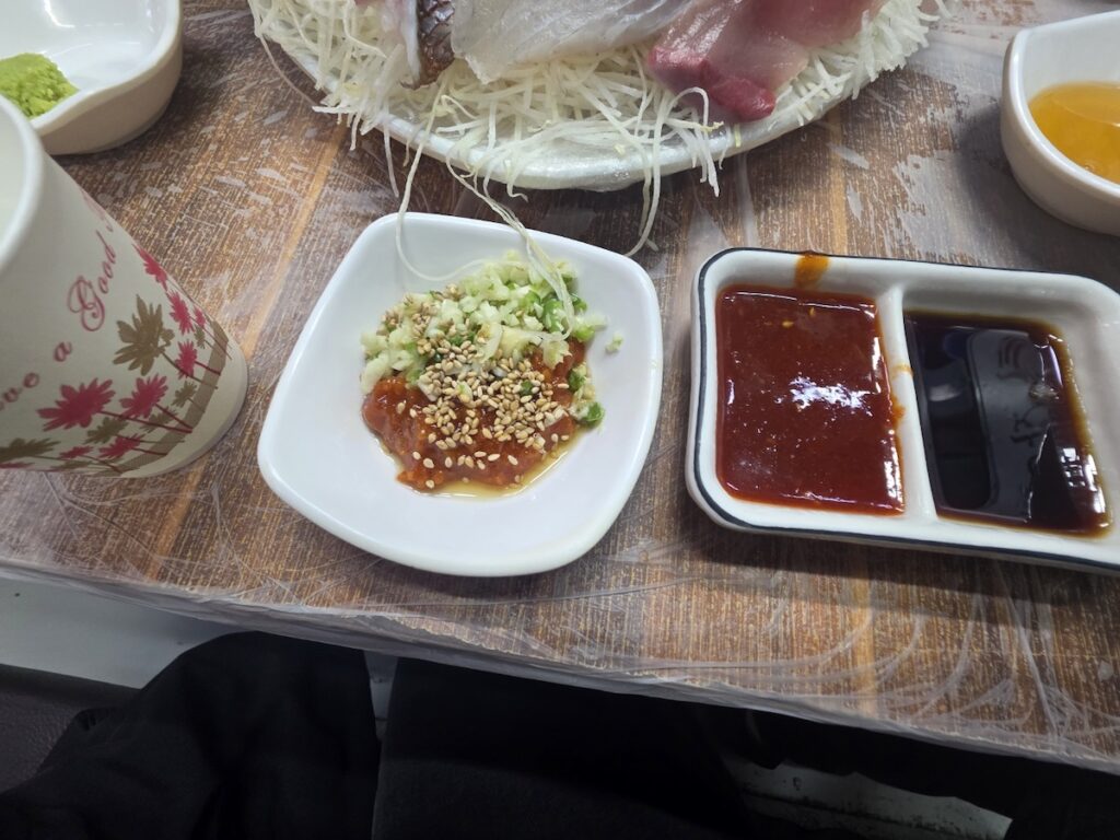 korean-sashimi-dipping-sauce-chojang-ssamjang Traditional Korean sashimi dipping sauces including spicy Chojang and savory Ssamjang for a local seafood experience.