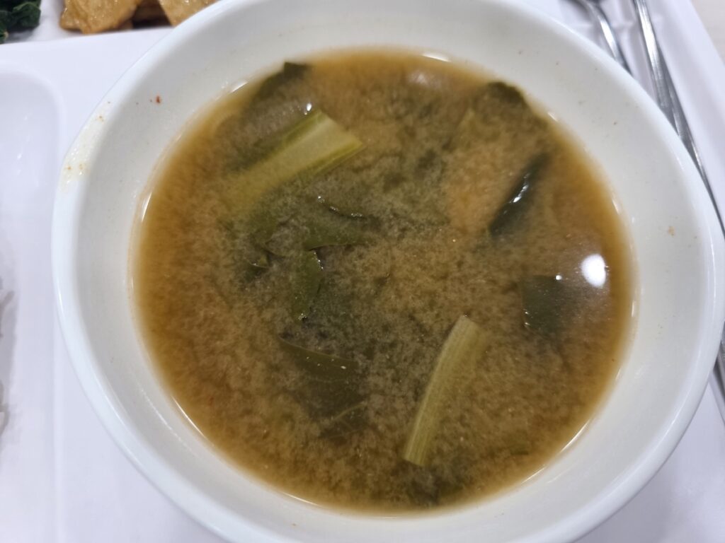 korean-soybean-paste-soup-with-chard-geundae-guk 7 Essential Tips for Vegetarians in Korea featuring a bowl of mild soybean paste soup made with fresh chard known as Geundae-guk.