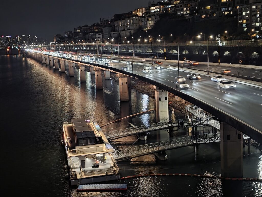 A cinematic night view from Dongho Bridge looking toward Hannam-dong, the heart of Seoul Expensive Apartments.