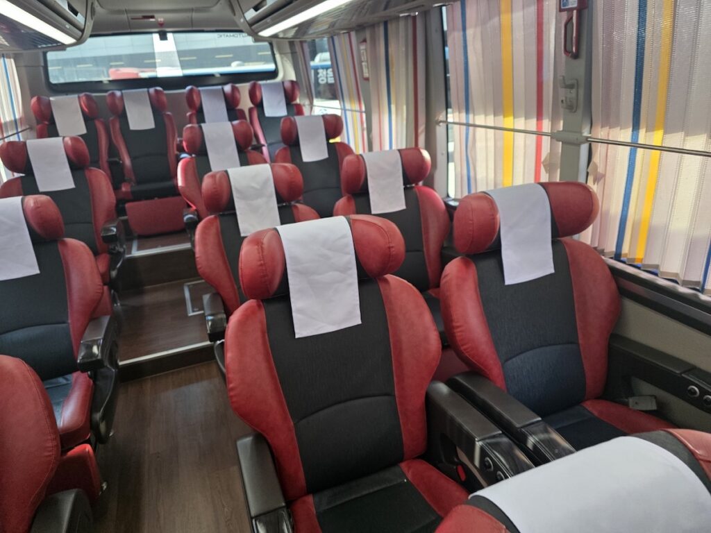 The 2+1 seating layout of an Excellent bus, a highlight of the Seoul Express Bus Terminal Guide.