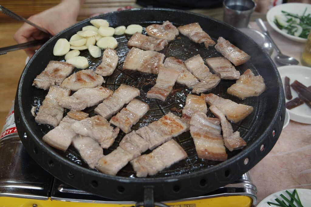 Modern Seoul BBQ restaurant with clean air ventilation and stainless-steel ducts.