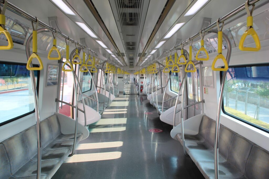 “Seoul Subway Line 1 seat design with blue patterned bench-style seating and priority seats marked near the doors”