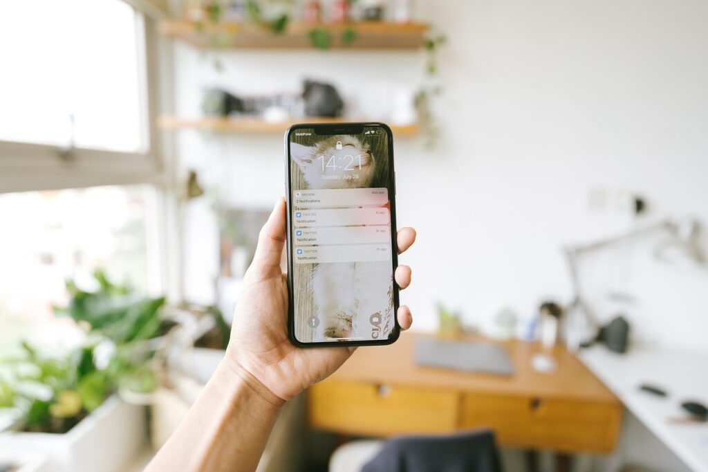 "A close-up of a smartphone held in hand, representing how travelers use their own phones in Korea 2025 for communication and navigation."