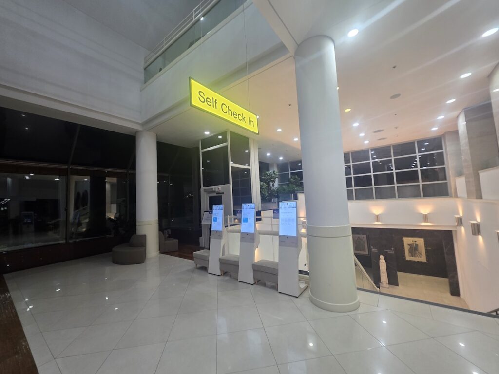 south-korea-golf-prices-self-check-in-kiosk Self check-in kiosks located in a spacious golf clubhouse lobby for efficient guest arrival in South Korea.