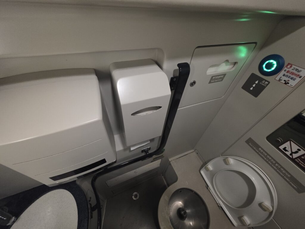 srt-onboard-restroom-cleanliness-standards The compact and surprisingly clean interior of an SRT onboard restroom, maintaining high standards for passengers.