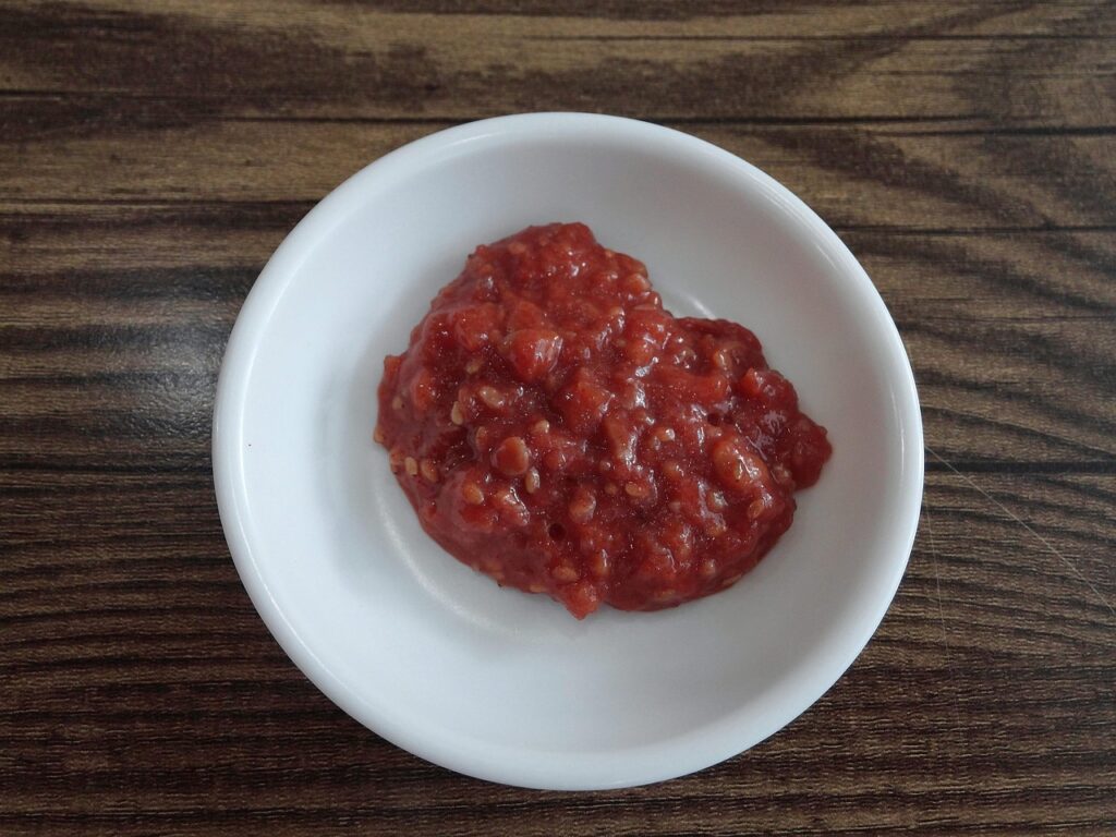 A small bowl of ssamjang, the savory Korean BBQ dipping sauce made from gochujang, doenjang, sesame oil, and garlic.