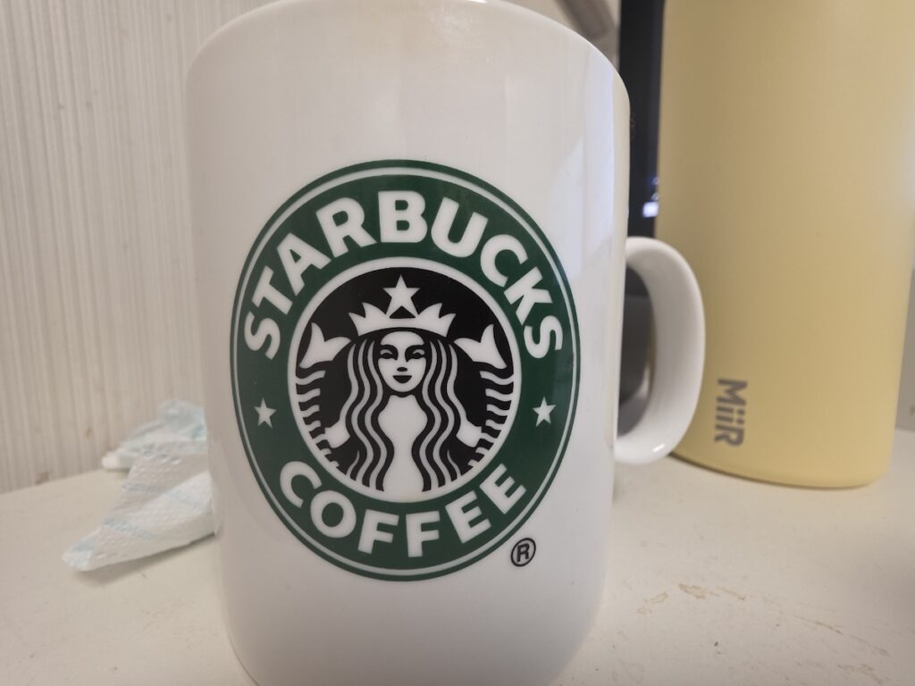 starbucks-korea-morning-coffee-mug Korea Travel: Budget Saving Guide - A Starbucks Korea mug representing the "Brunch Your Way" morning ritual.