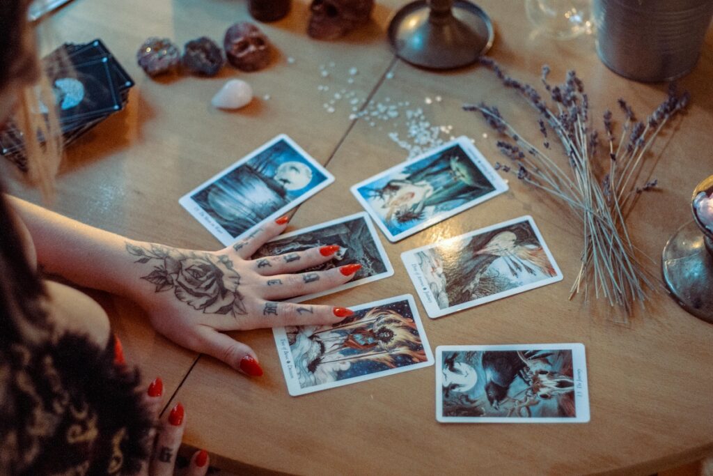 “Tarot cards spread on a café table in Seoul, representing how fortune-telling has become part of daily life in modern Korea.”