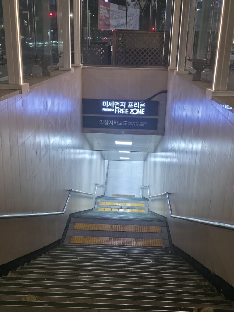 A walking path around Yeoksam Station where pedestrians pass through the business area.