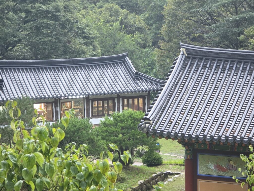 Wide view of Yongmunsa Temple complex with traditional Korean architecture”